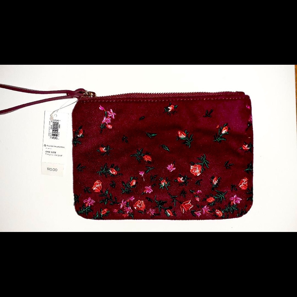 NEW  Maroon velvet wristlet with roses on on the front of it!